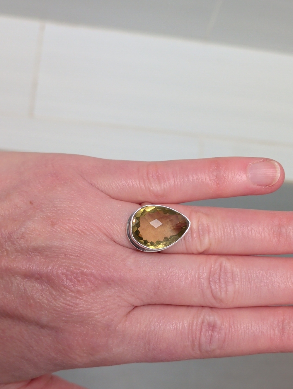 Sterling Silver Ring with Pear-Shaped Yellow-Green Natural Gemstone